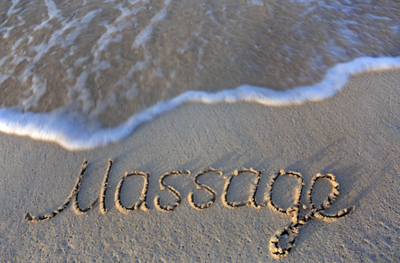 massage écrit sur le sable